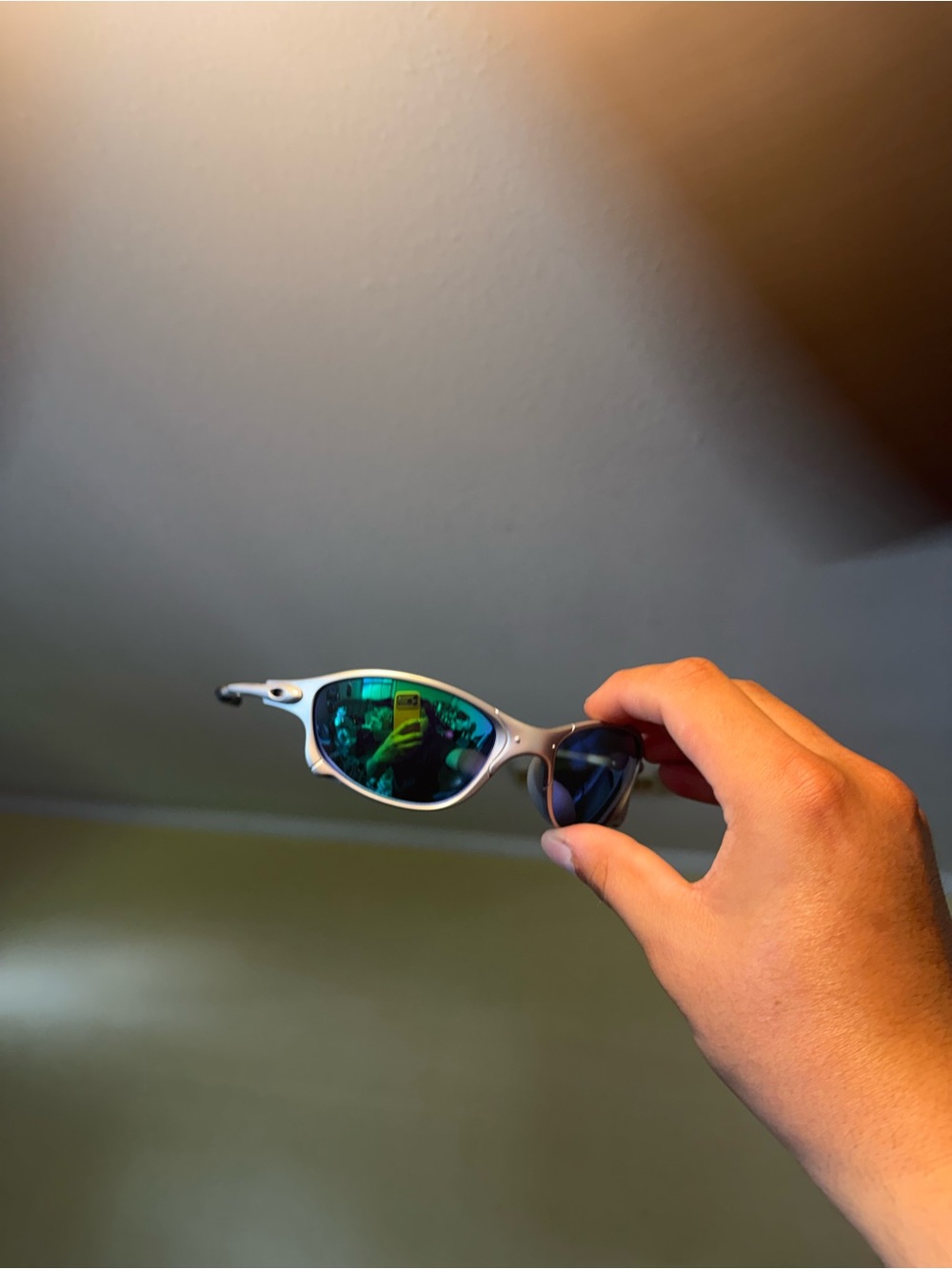 Sporty Silver Sunglasses with Mirrored Green Lenses Oakleys Oakley